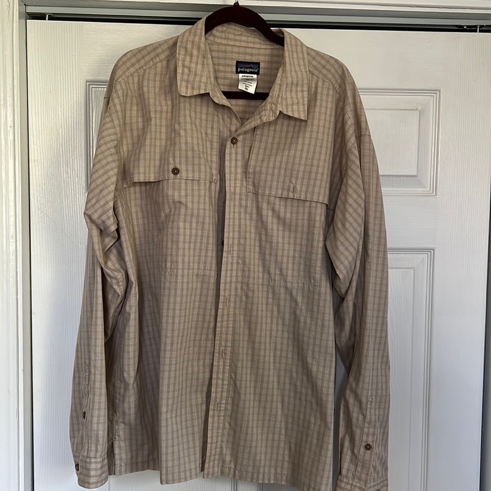 Patagonia long sleeved fishing shirt.  Tan plaid size men’s XXL